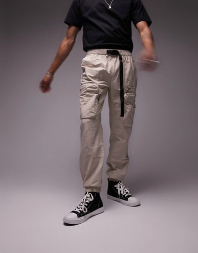 Pantaloni cargo color pietra cut and sew skinny con cintura - Topman - Modalova