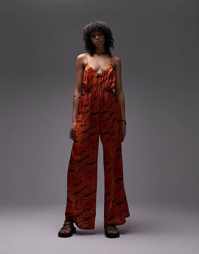 Tuta jumpsuit a fondo ampio aderente con fascette e stampa - Topshop - Modalova