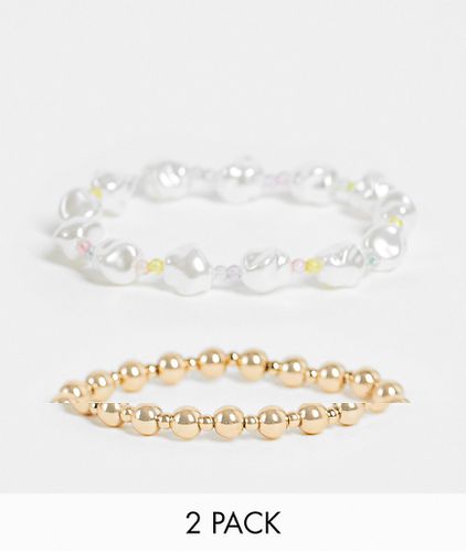 Confezione multipack da due bracciali con perle sintetiche e perline, colore bianco e - Topshop - Modalova