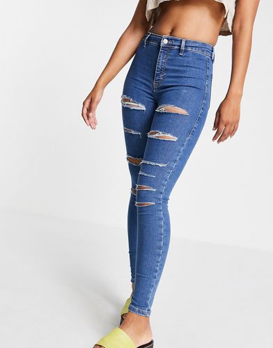 Joni - Jeans con strappi vistosi medio - Topshop - Modalova