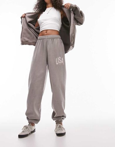 Joggers oversize color talpa lavaggio vintage con grafica "USA" sfocata in coordinato - Topshop - Modalova