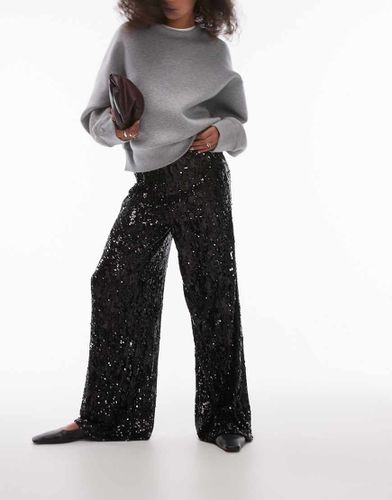 Pantaloni a fondo ampio neri con paillettes - Topshop - Modalova