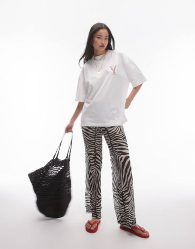 Pantaloni monocromatici in tessuto stropicciato trasparente con motivo astratto - Topshop - Modalova