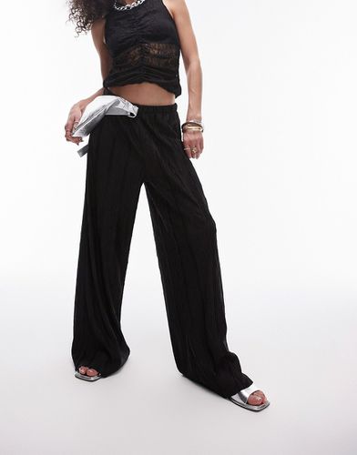 Pantaloni stropicciati plissé neri a fondo ampio - Topshop - Modalova