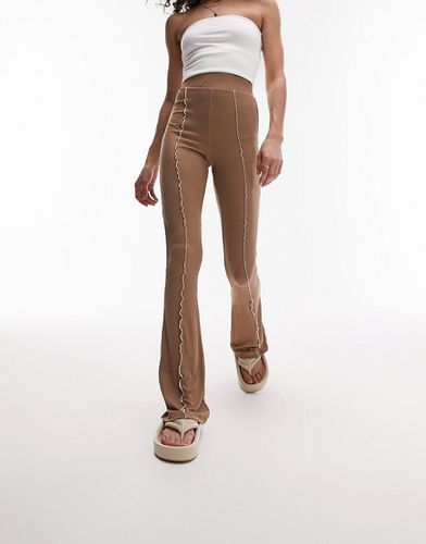 Premium Edit - Pantaloni a zampa marroni con cuciture a vista in coordinato - Topshop - Modalova