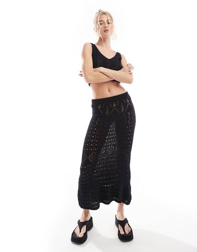 Crop top all'uncinetto e gonna lunga nera - Threadbare - Modalova