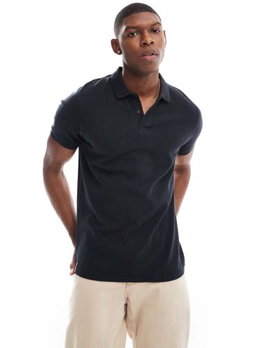 Polo in jersey nera con colletto a coste - Threadbare - Modalova