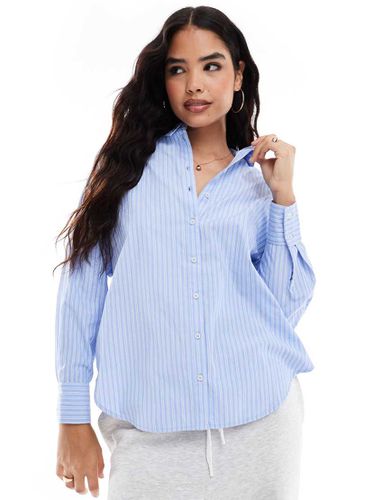 Camicia oversize azzurra e bianca a righe - Vero Moda - Modalova