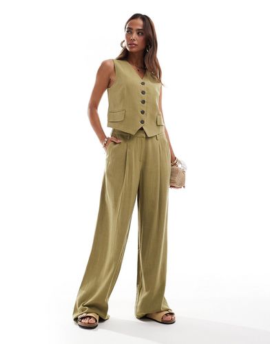 Pantaloni in misto lino color oliva con piega sul davanti in coordinato - Vero Moda - Modalova