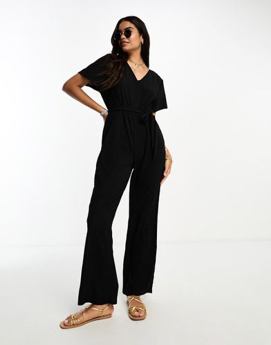 Tuta jumpsuit nera con maniche con volant - Vero Moda - Modalova