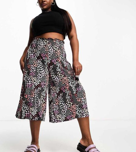 Pantaloni culotte con fondo ampio e arricciatura in vita nera a fiori - Yours - Modalova