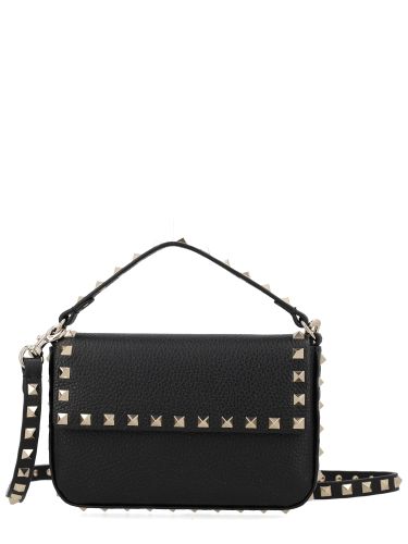 Pouch rockstud in vitello granato - valentino garavani - Modalova