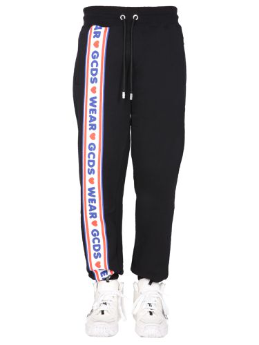 Jogging pants with "cute tape" logo band - gcds - Modalova