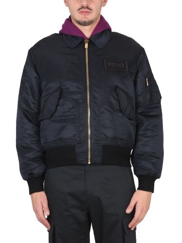 Bomber jacket with applied logo - versace - Modalova