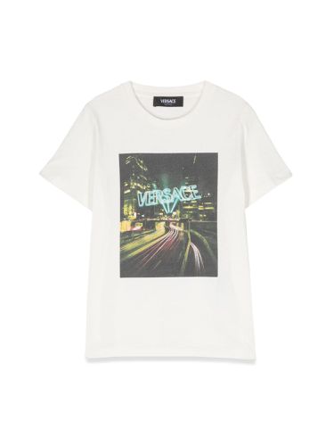 Blinding lights print jersey t-shirt - versace - Modalova