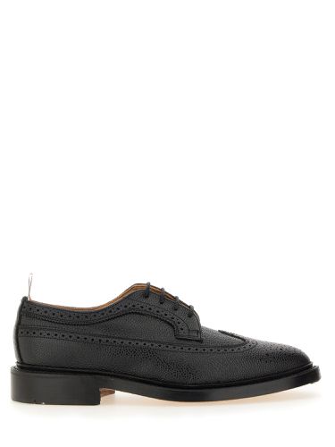 Thom browne brogue classic longwing - thom browne - Modalova