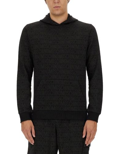 Sweatshirt with all over logo - moschino - Modalova