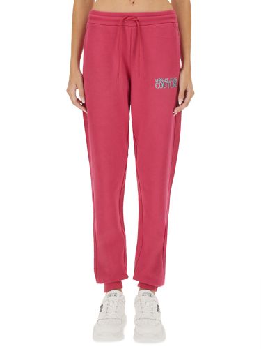 Jogging pants with logo - versace jeans couture - Modalova