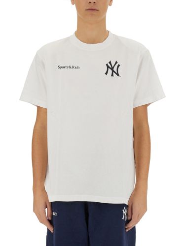 Sporty & rich t-shirt with logo - sporty & rich - Modalova