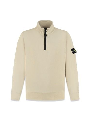 Polo shirt with half zipper - stone island - Modalova