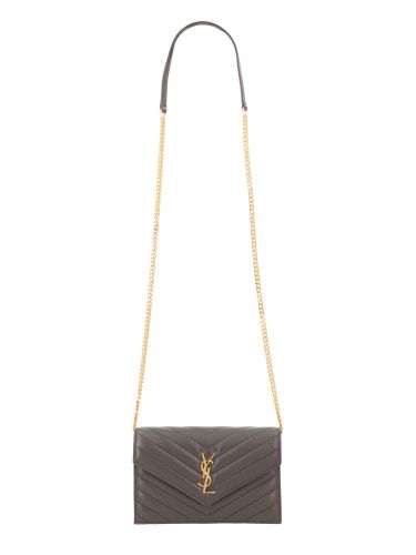 Portafoglio con catena "envelope cassandre" - saint laurent - Modalova
