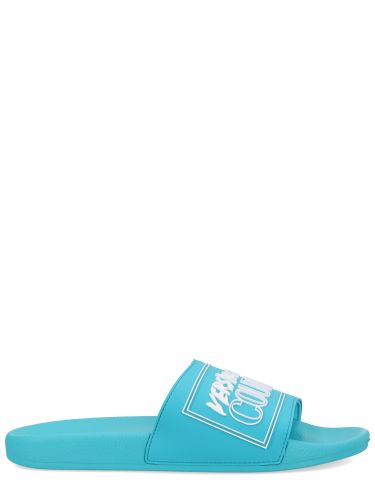 Slides with logo - versace jeans couture - Modalova
