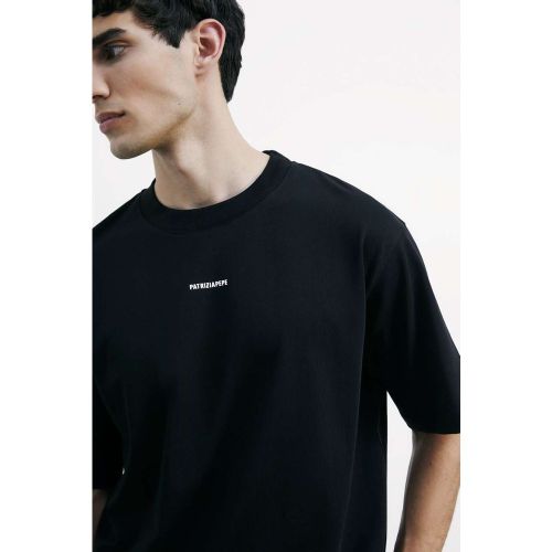 T-shirt essenziale realizzata in cotone strutturato con vestibilità oversize. Taglio dritto e modello girocollo, con logo sul davanti per un dettagli - 8058701533473 - Modalova