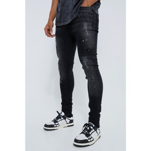 Jeans Super Skinny Fit effetto smagliato con schizzi di colore - boohoo - Modalova