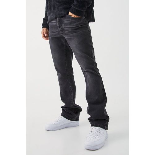 Jeans a zampa Slim Fit in denim rigido - boohoo - Modalova