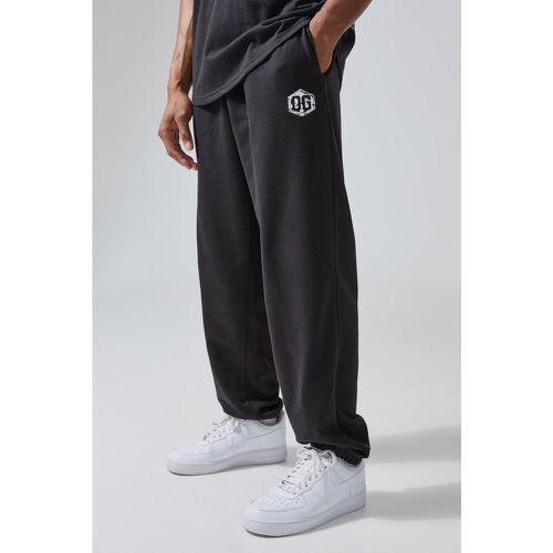 Pantaloni tuta oversize Man Active X Og Gym - boohoo - Modalova