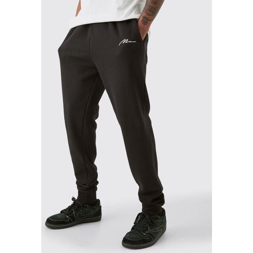 Pantaloni tuta Tall Slim Fit neri con firma Man - boohoo - Modalova