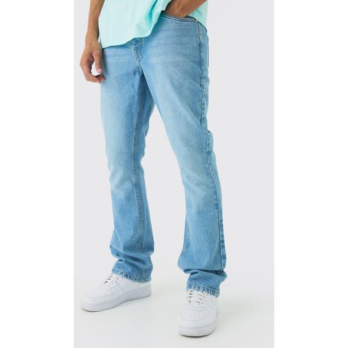 Jeans a zampa Slim Fit in denim rigido - boohoo - Modalova