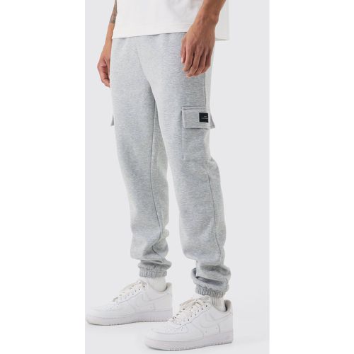 Pantaloni tuta Cargo Slim Fit Basic con etichetta intessuta - boohoo - Modalova