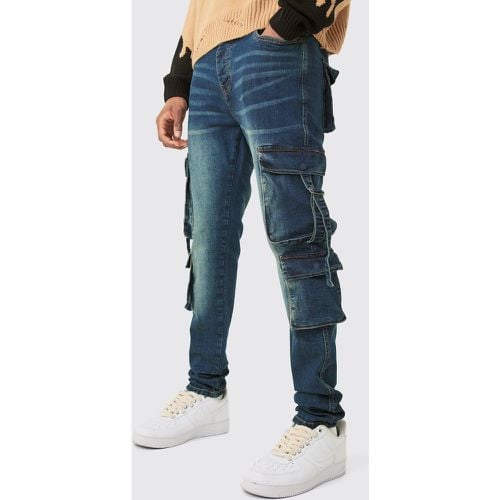 Jeans Tall Skinny Fit in Stretch in lavaggio scuro con tasche Cargo - boohoo - Modalova