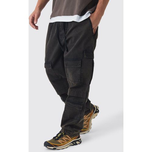 Pantaloni Cargo Skate Fit elasticizzati in nylon ripstop in lavaggio a olio - boohoo - Modalova