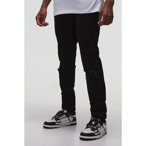 Jeans Tall Stretch Skinny Fit con strappi sul ginocchio e pieghe sul fondo - boohoo - Modalova