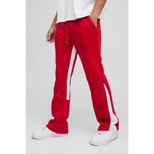 Pantaloni tuta Regular Fit con inserti in tessuto grezzo e applique a cuore - boohoo - Modalova