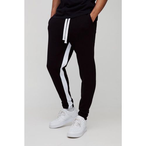 Pantaloni tuta Skinny Fit con inserti - boohoo - Modalova