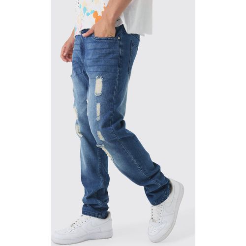 Jeans Slim Fit strappati effetto smagliato - boohoo - Modalova