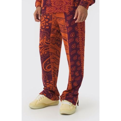 Pantaloni tuta rilassati in jacquard in fantasia cachemire con spacco sul fondo - boohoo - Modalova