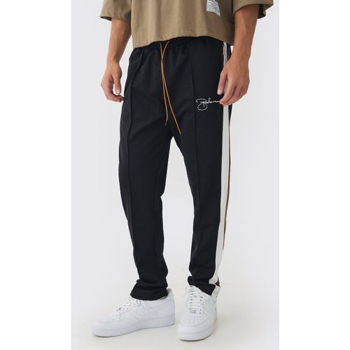 Pantaloni tuta affusolati Slim Fit con pannelli in piqué e ricamo man - boohoo - Modalova