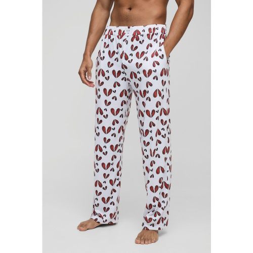 Pantaloni da casa rilassati con scritta Broken Hearts - boohoo - Modalova