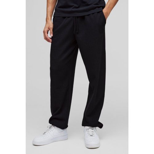 Pantalón Deportivo Oversize Man De Tela Gofre Con Botamanga Y Bordado - boohoo - Modalova