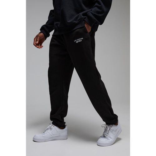 Pantaloni tuta oversize Man Active Training Dept - boohoo - Modalova