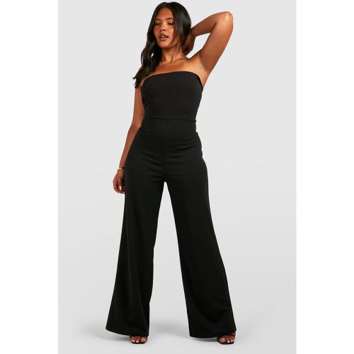 Tuta intera Plus Size a fascia a gamba ampia - boohoo - Modalova