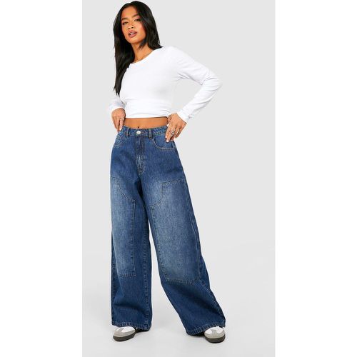 Jeans a gamba ampia Petite stile Carpenter - boohoo - Modalova