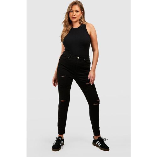 Jeans Plus Size Skinny Fit effetto smagliato - boohoo - Modalova