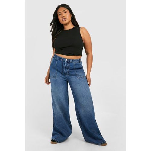 Jeans Plus Size a gamba ampia con vita elasticizzata - boohoo - Modalova