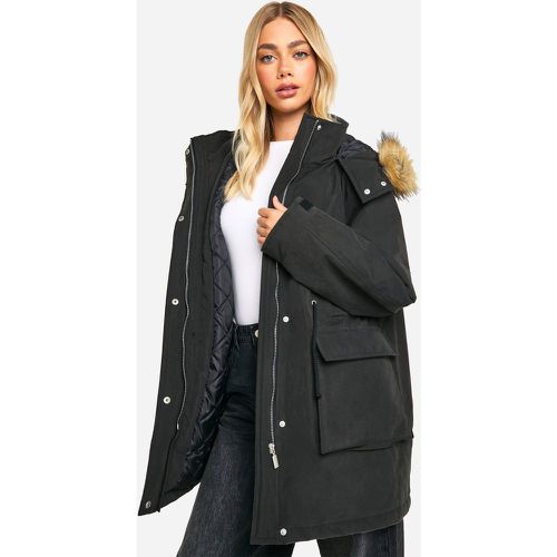 Parka con tasche e cappuccio, Nero - boohoo - Modalova