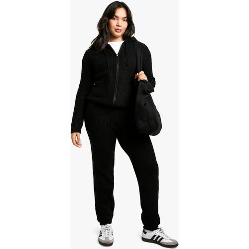 Tuta sportiva Plus Size in maglia morbida con zip e cappuccio - boohoo - Modalova